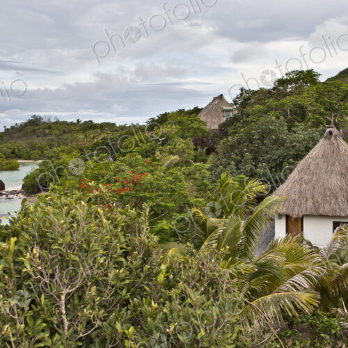 Buildings With Thatched Roofs On Tropical Island Buildings With Thatched Roofs On Tropical Island