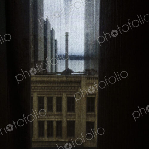 Buildings seen through a window screen, Seattle, WA USA Buildings seen through a window screen, Seattle, WA USA