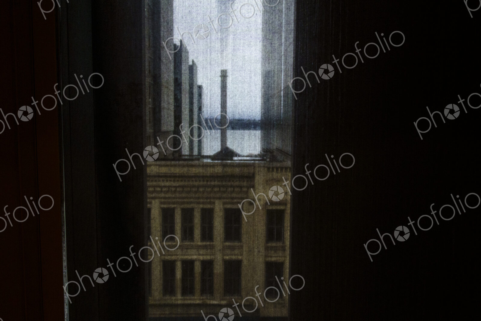 Buildings seen through a window screen, Seattle, WA USA