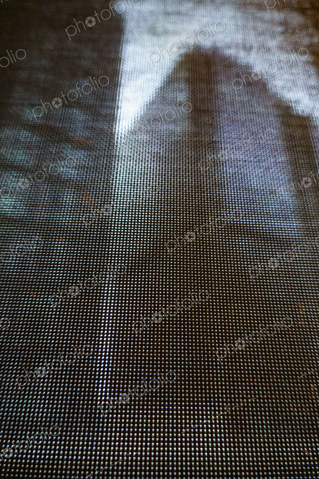 Buildings seen through a window screen, Seattle, WA USA