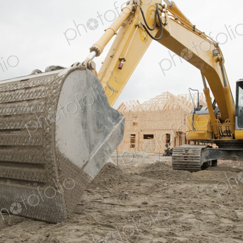 Bulldozer breaking ground at construction site