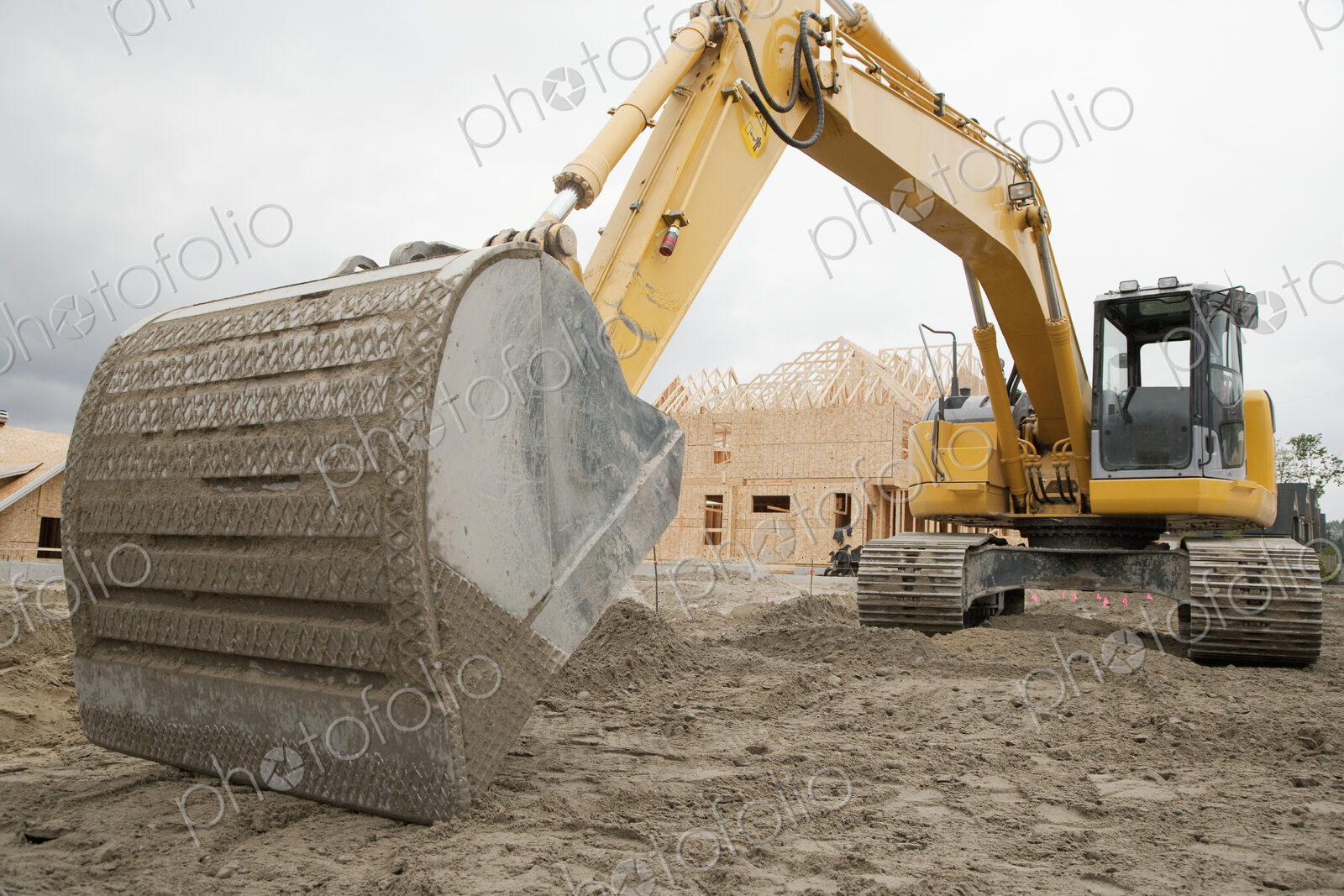 Bulldozer breaking ground at construction site