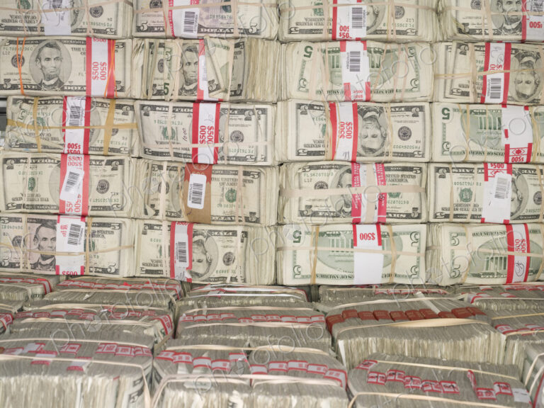 Bundles of Five Dollar Bills