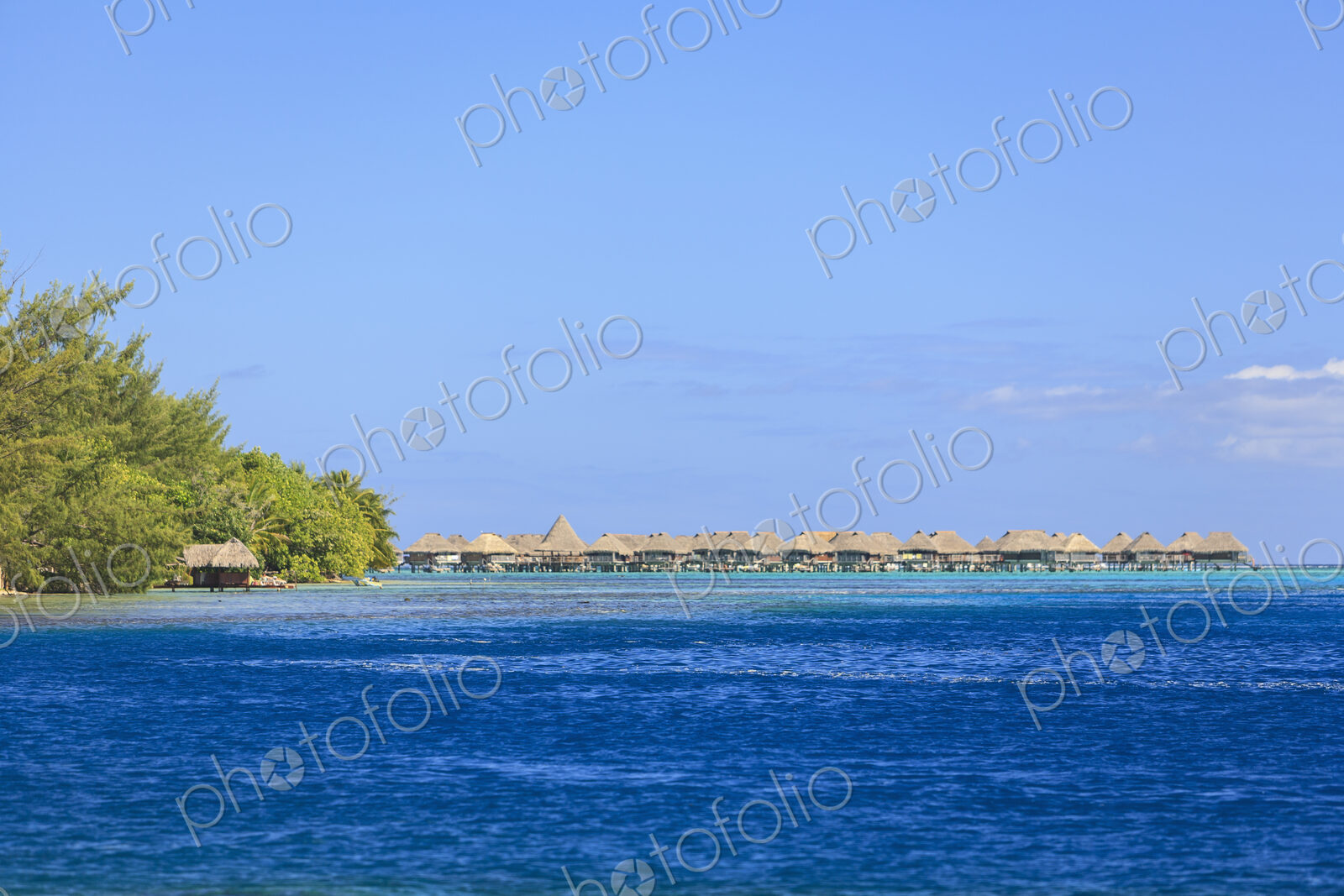Bungalows on tropical ocean, Bora Bora, French Polynesia