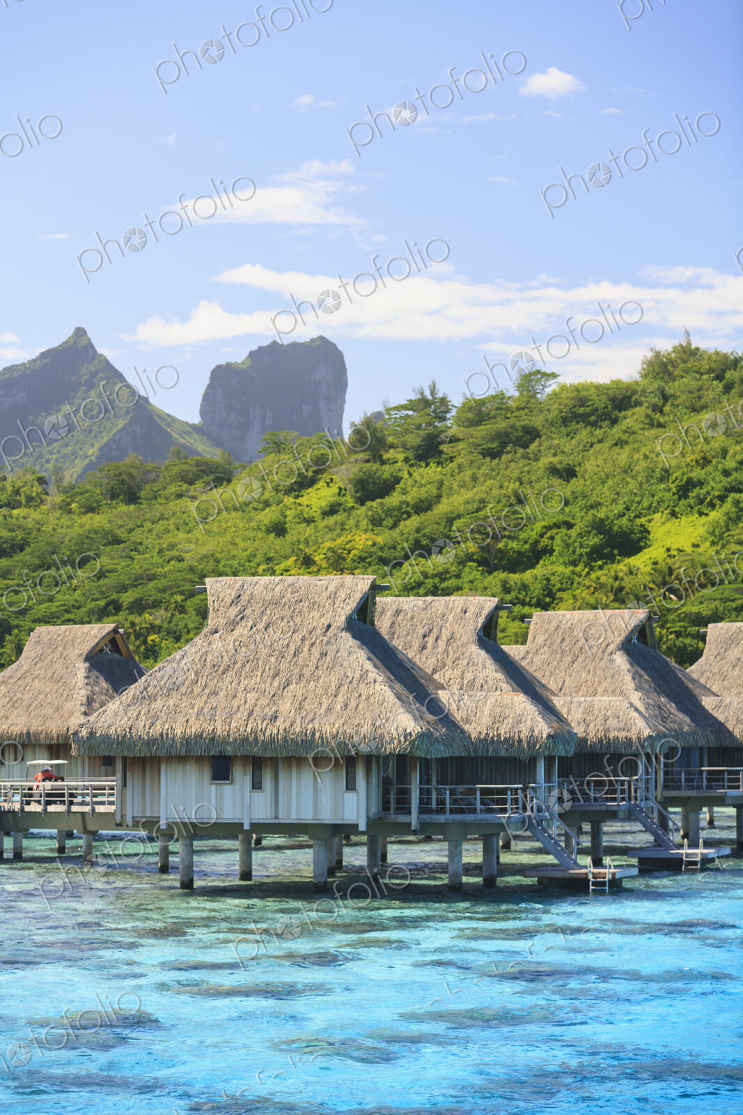 Bungalows over tropical ocean, Bora Bora, French Polynesia