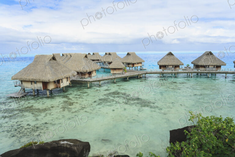 Bungalows over tropical ocean, Bora Bora, French Polynesia