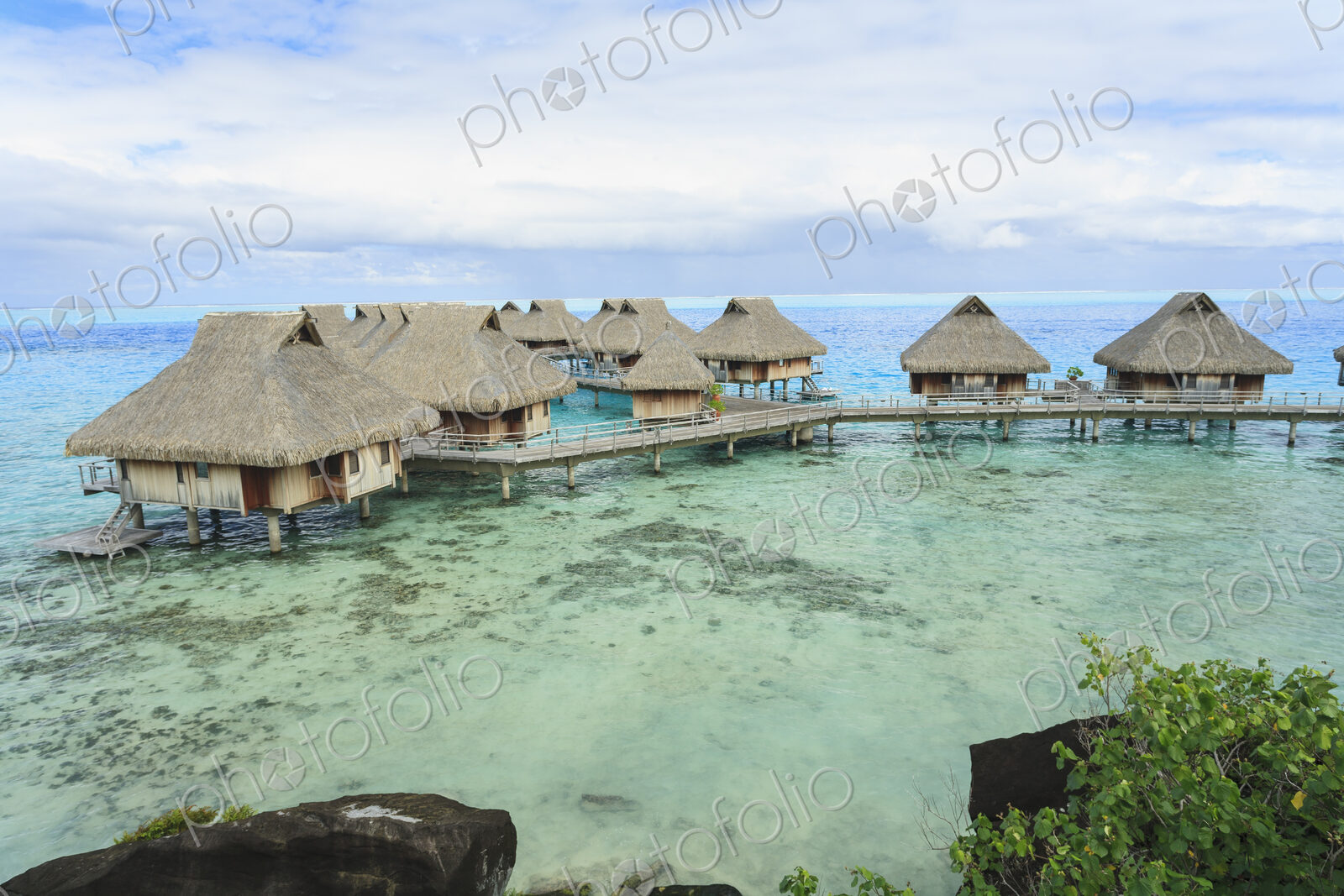 Bungalows over tropical ocean, Bora Bora, French Polynesia