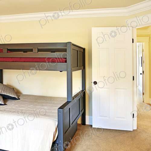 Bunk beds near open doorway Bunk beds near open doorway