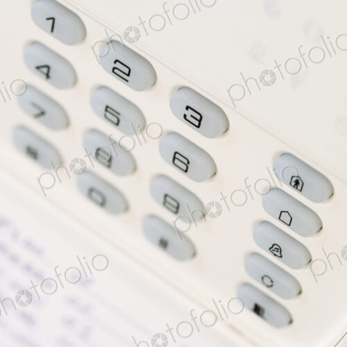 Burglar Alarm control pad on a wall