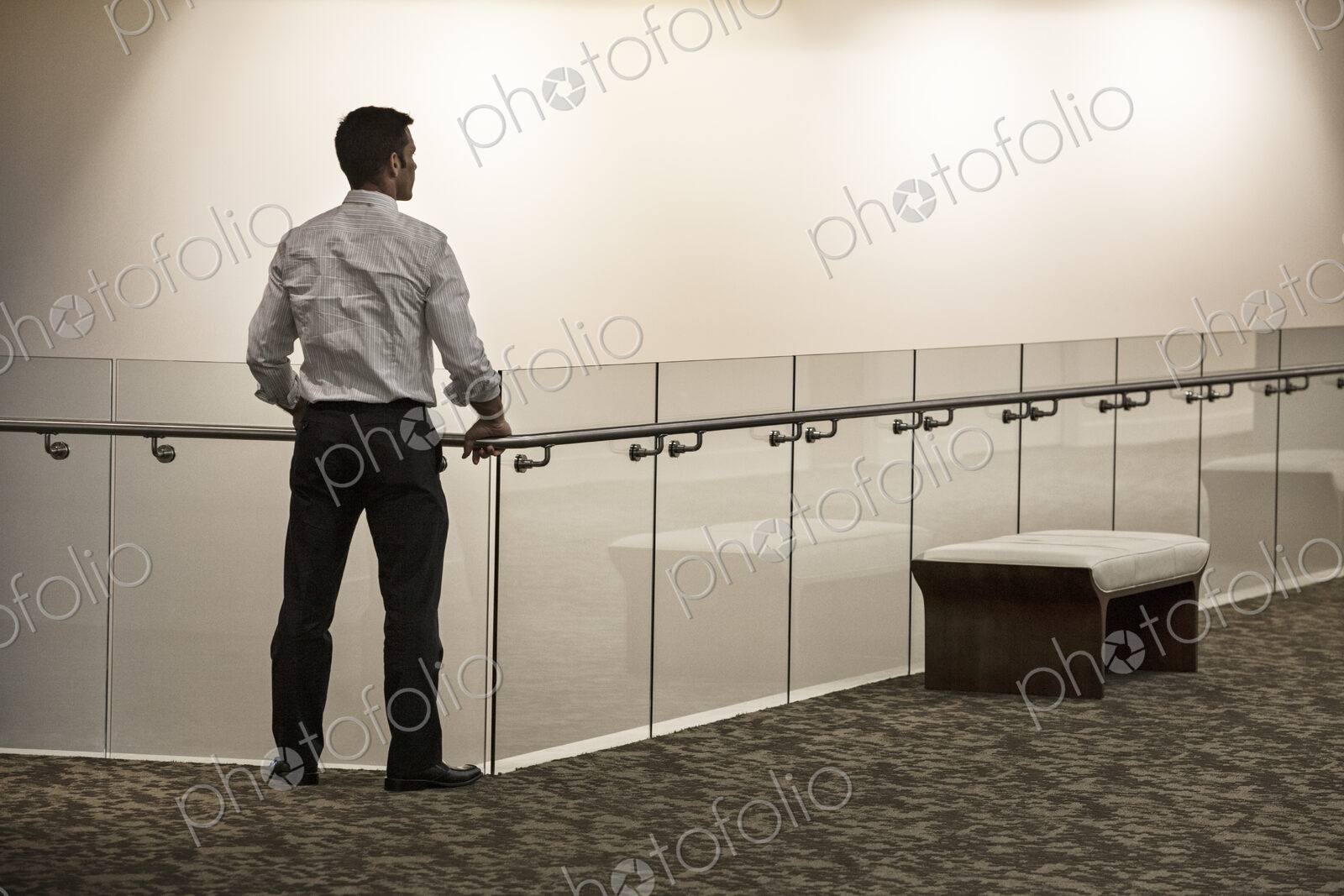Businessman in a business center hallway