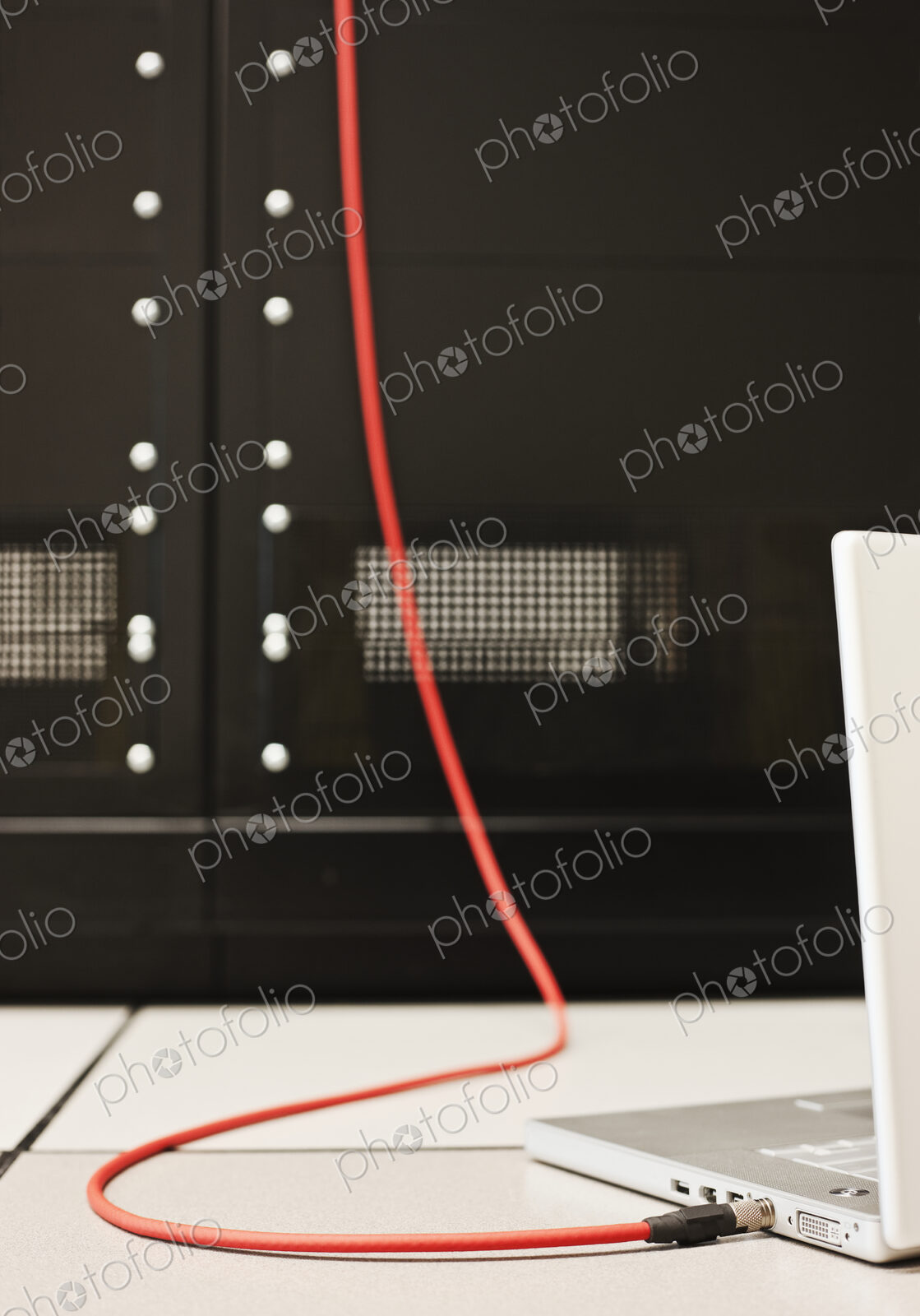 Cable plugged into laptop.