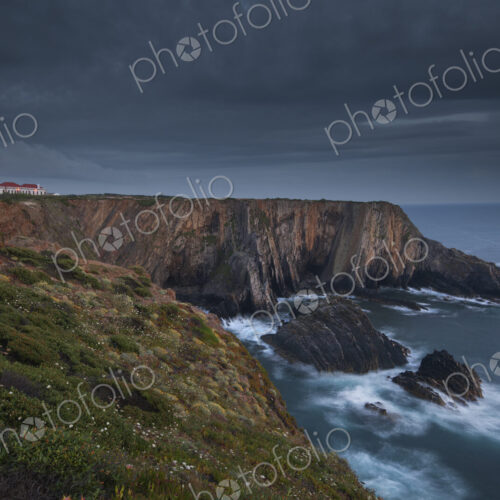 Cabo Sardao Lighthouse is a historic light on the cliffs along the coast of the Cabo…
