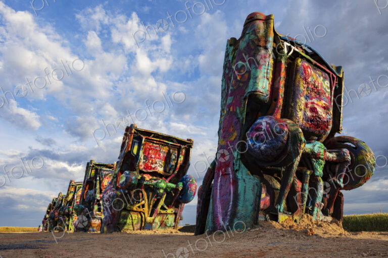 Cadillac Ranch, public art installation created in 1974, a row of 10 cadillac cars…