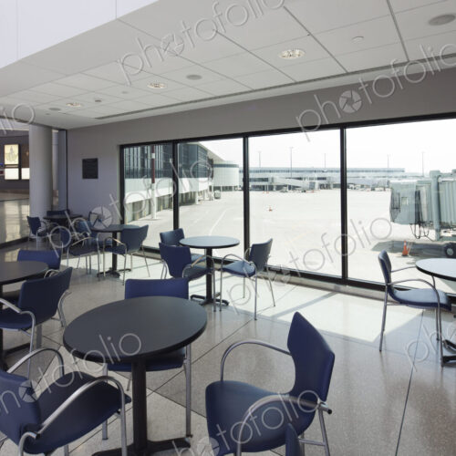 Cafe with a view to the airport apron,and arrivals and departures gates.
