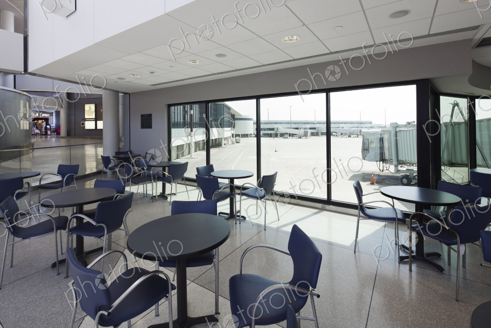 Cafe with a view to the airport apron,and arrivals and departures gates.