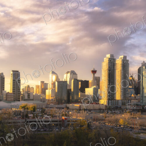 Calgary cityscape lit up at dawn.