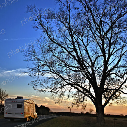 Camper Driving Down a Country Road Camper Driving Down a Country Road