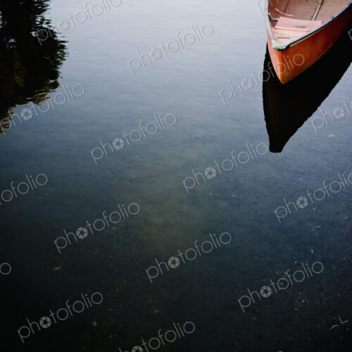 Canoe on calm lake
