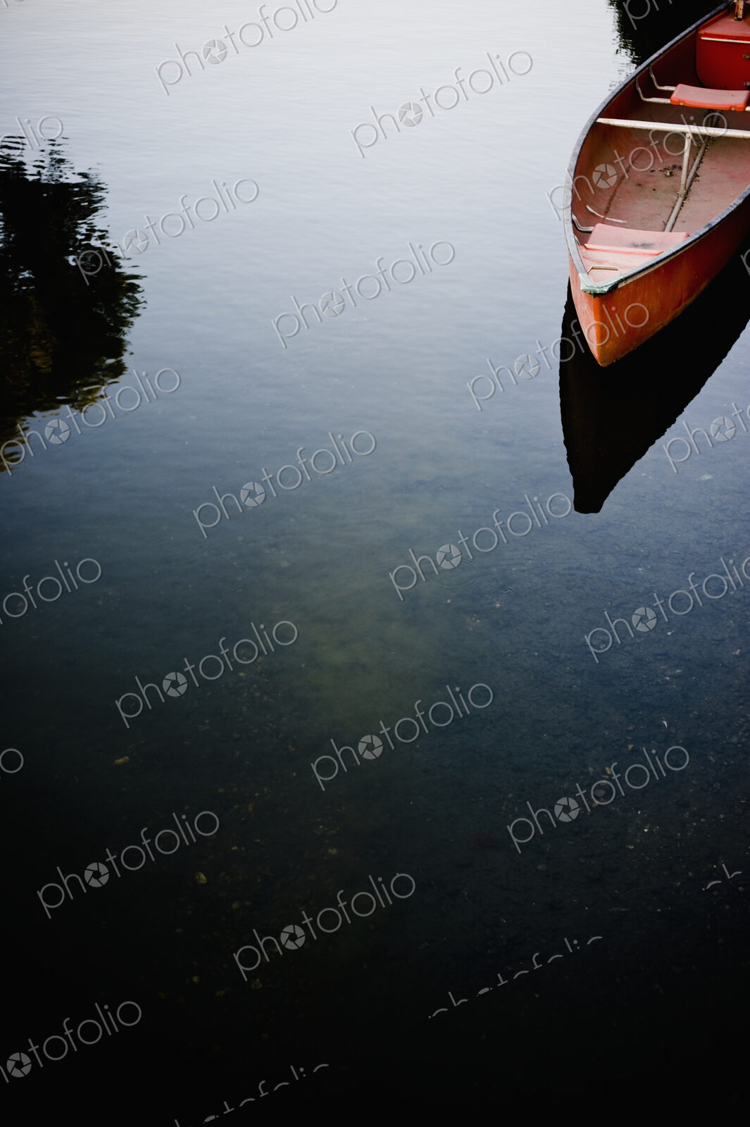 Canoe on calm lake