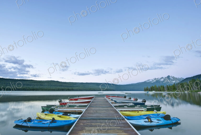 Canoes Docked on a Lake
