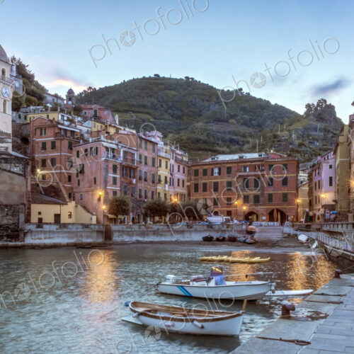Canoes docked in Vernazza harbor, La Spezia, Italy Canoes docked in Vernazza harbor, La Spezia, Italy