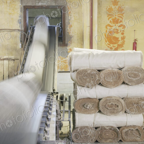 Canvas Rolls on a Conveyor