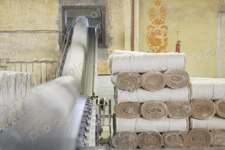 Canvas Rolls on a Conveyor