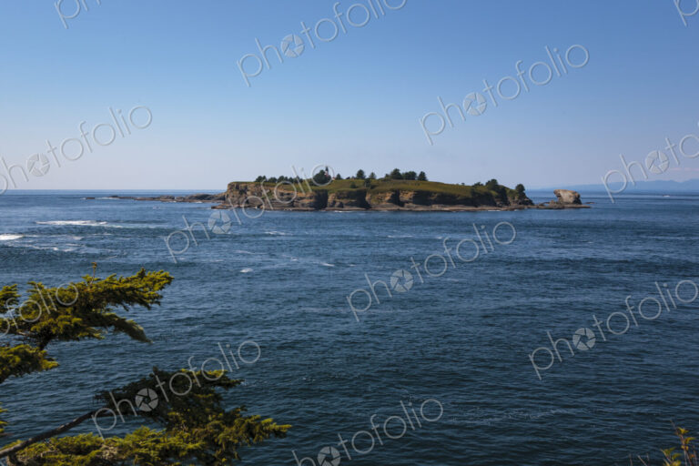 Cape Flattery, Tatoosh Island and Cape Flattery Light, view of an offshore island with…