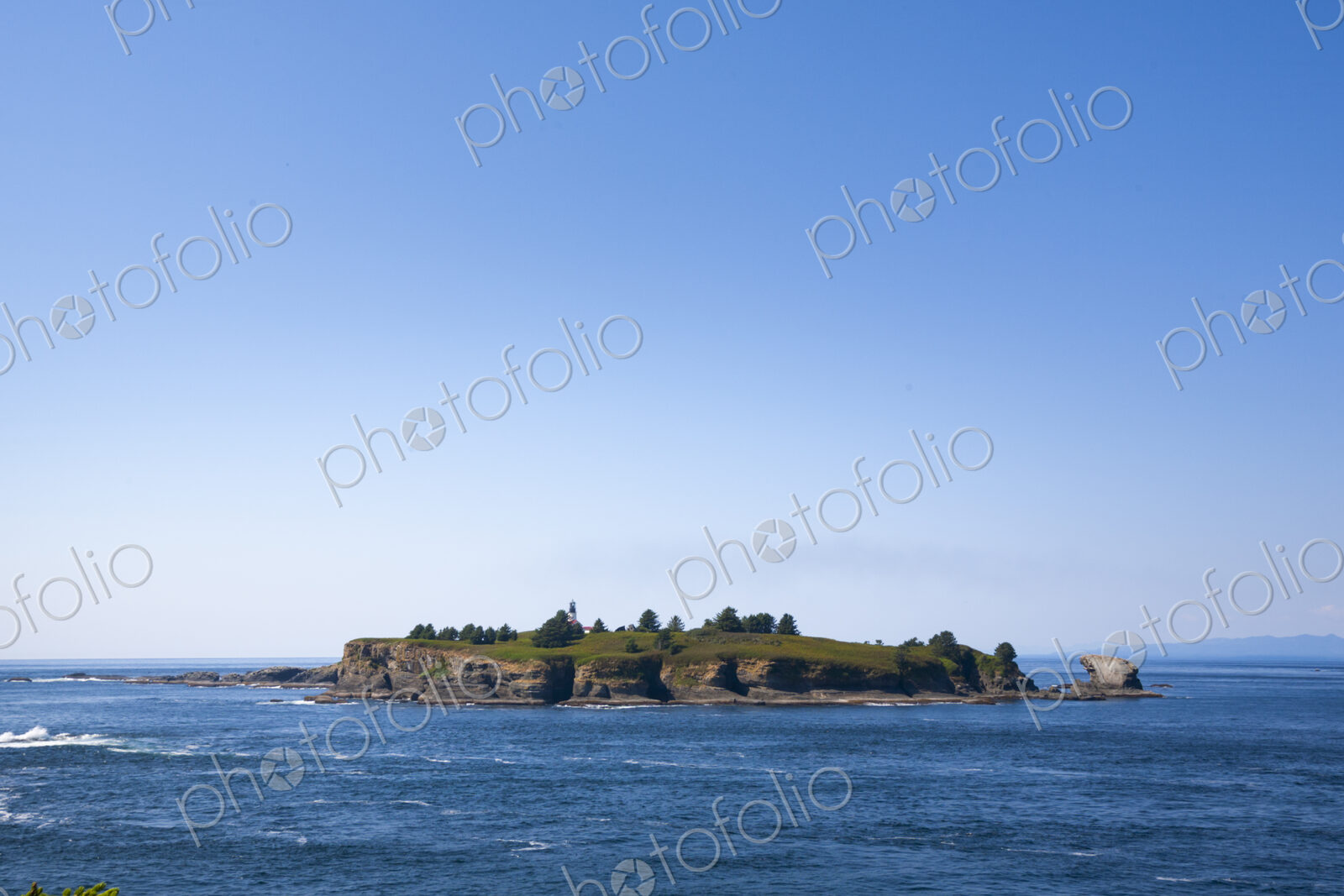Cape Flattery, Tatoosh Island and Cape Flattery Light, view of an offshore island with…