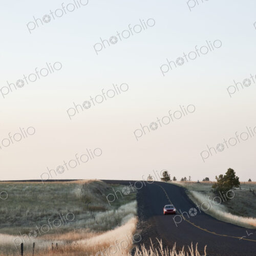 Car driving on rural highway. Car driving on rural highway.