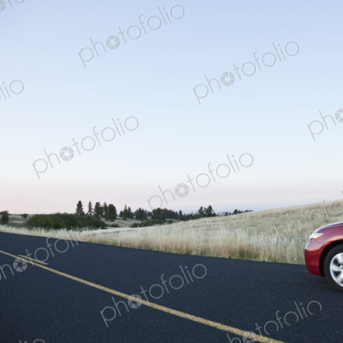 Car driving on rural highway. Car driving on rural highway.