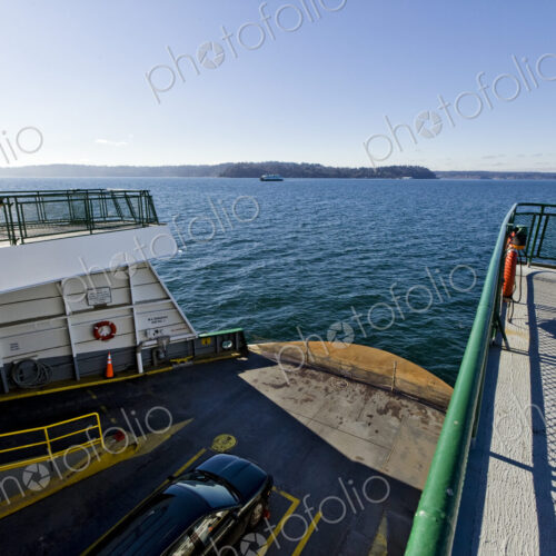 Car in cargo hold of ferry boat
