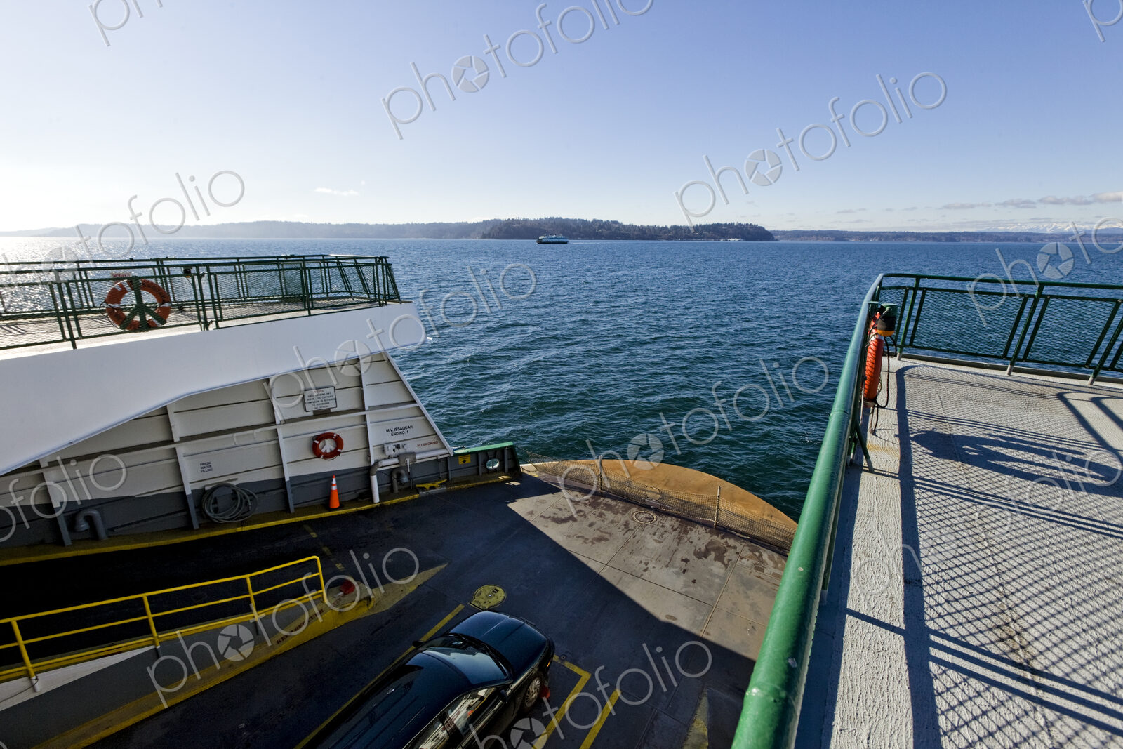Car in cargo hold of ferry boat
