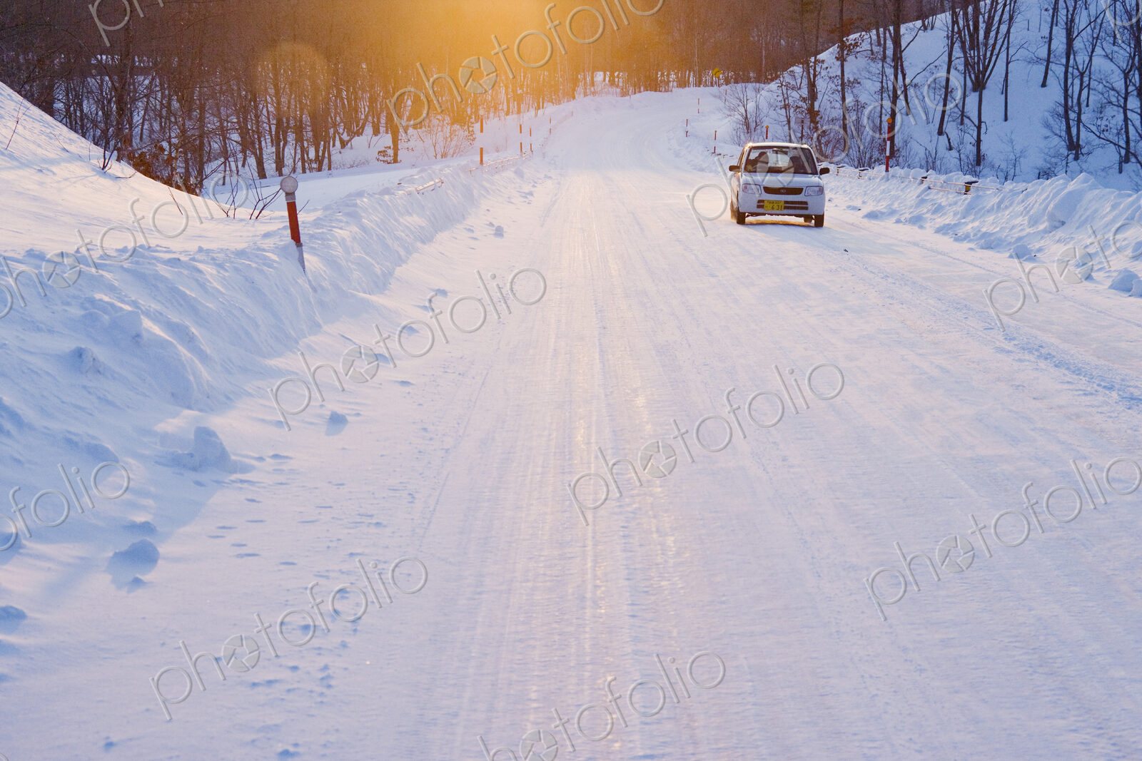 Car on Snow Covered Road