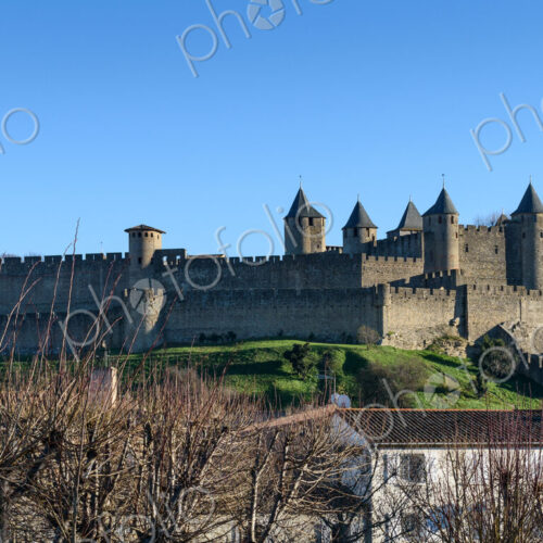Carcassonne, the skyline of the citadel, Château Comtal and medieval buildings with… Carcassonne, the skyline of the citadel, Château Comtal and medieval buildings with…
