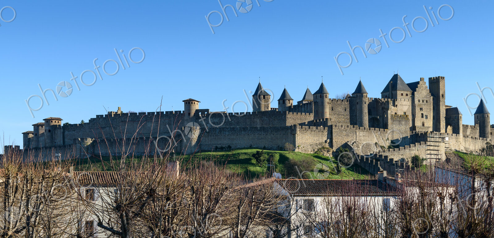 Carcassonne, the skyline of the citadel, Château Comtal and medieval buildings with…