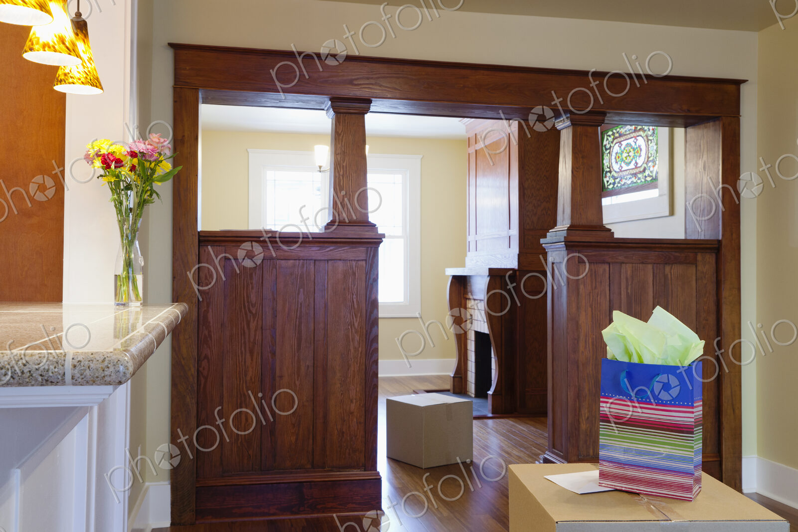 Cardboard boxes and gift in new house
