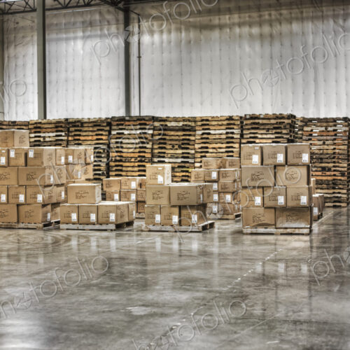 Cardboard boxes and pallets in warehouse