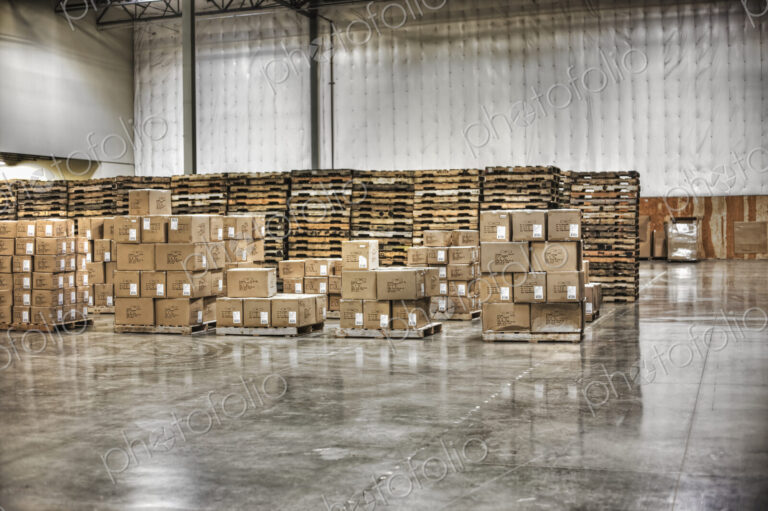 Cardboard boxes and pallets in warehouse