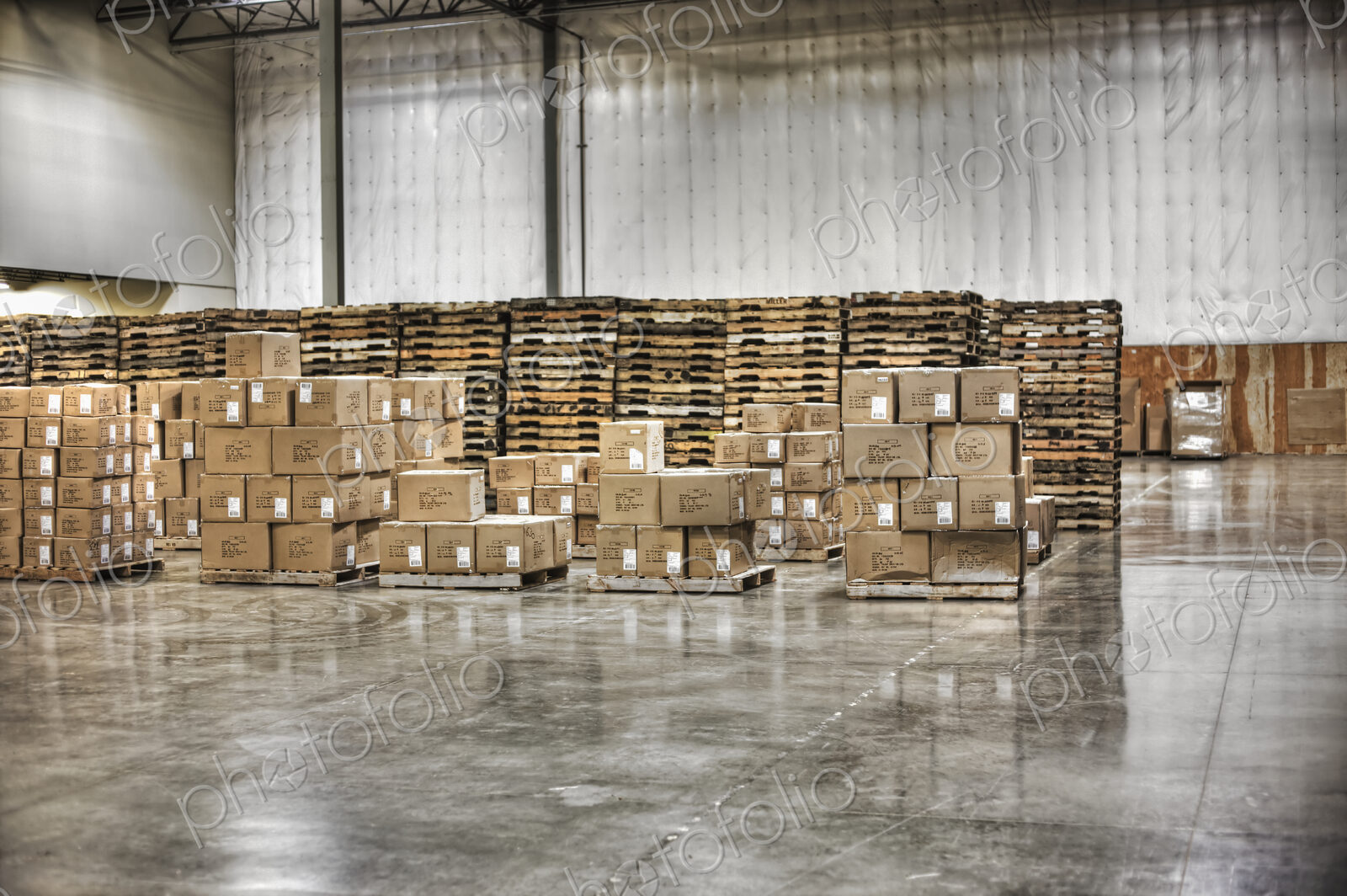 Cardboard boxes and pallets in warehouse