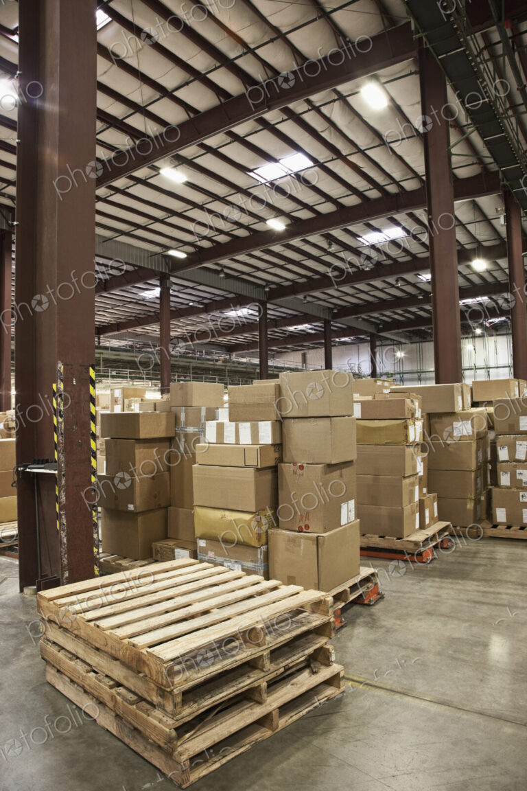 Cardboard boxes and pallets in warehouse