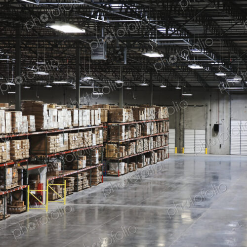 Cardboard boxes on shelves in warehouse