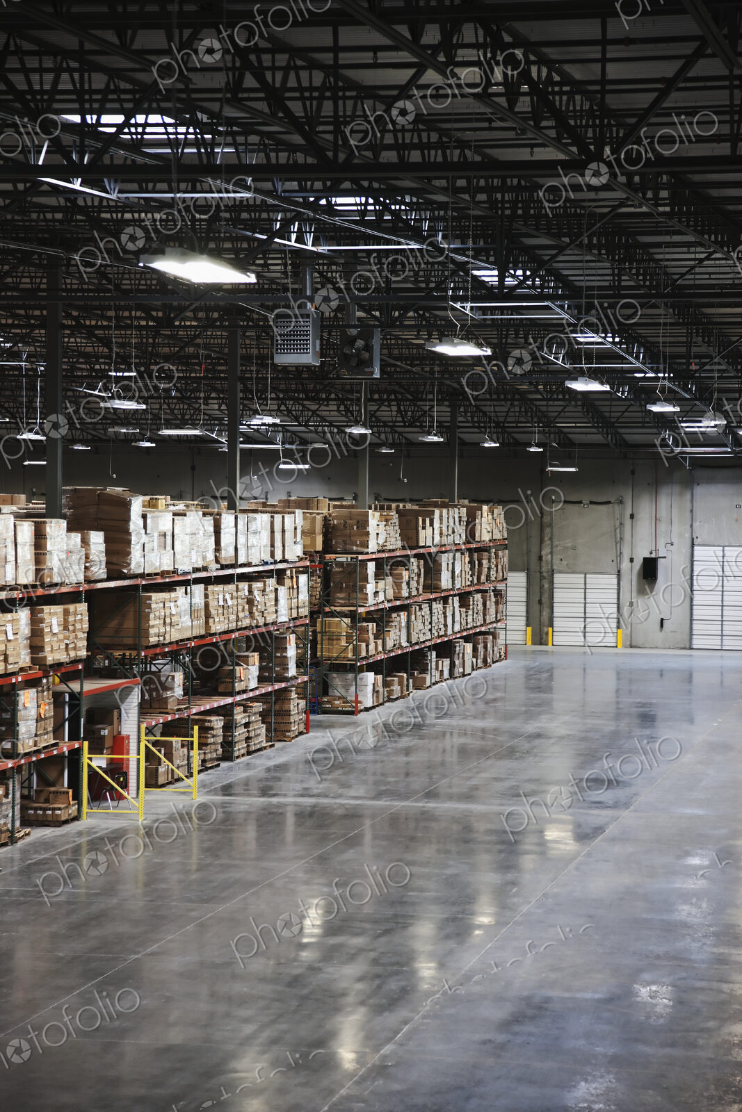 Cardboard boxes on shelves in warehouse