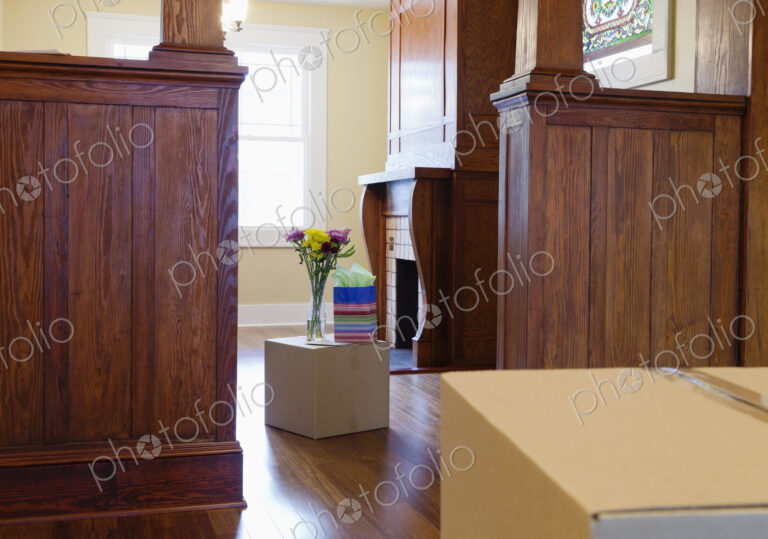 Cardboard boxes with gifts in new house