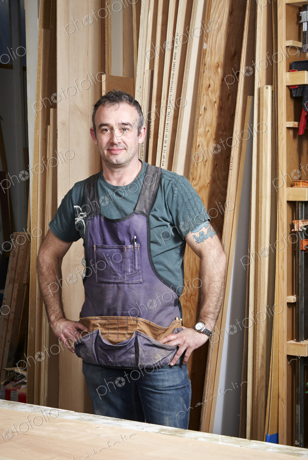 Carpenter smiling in workshop