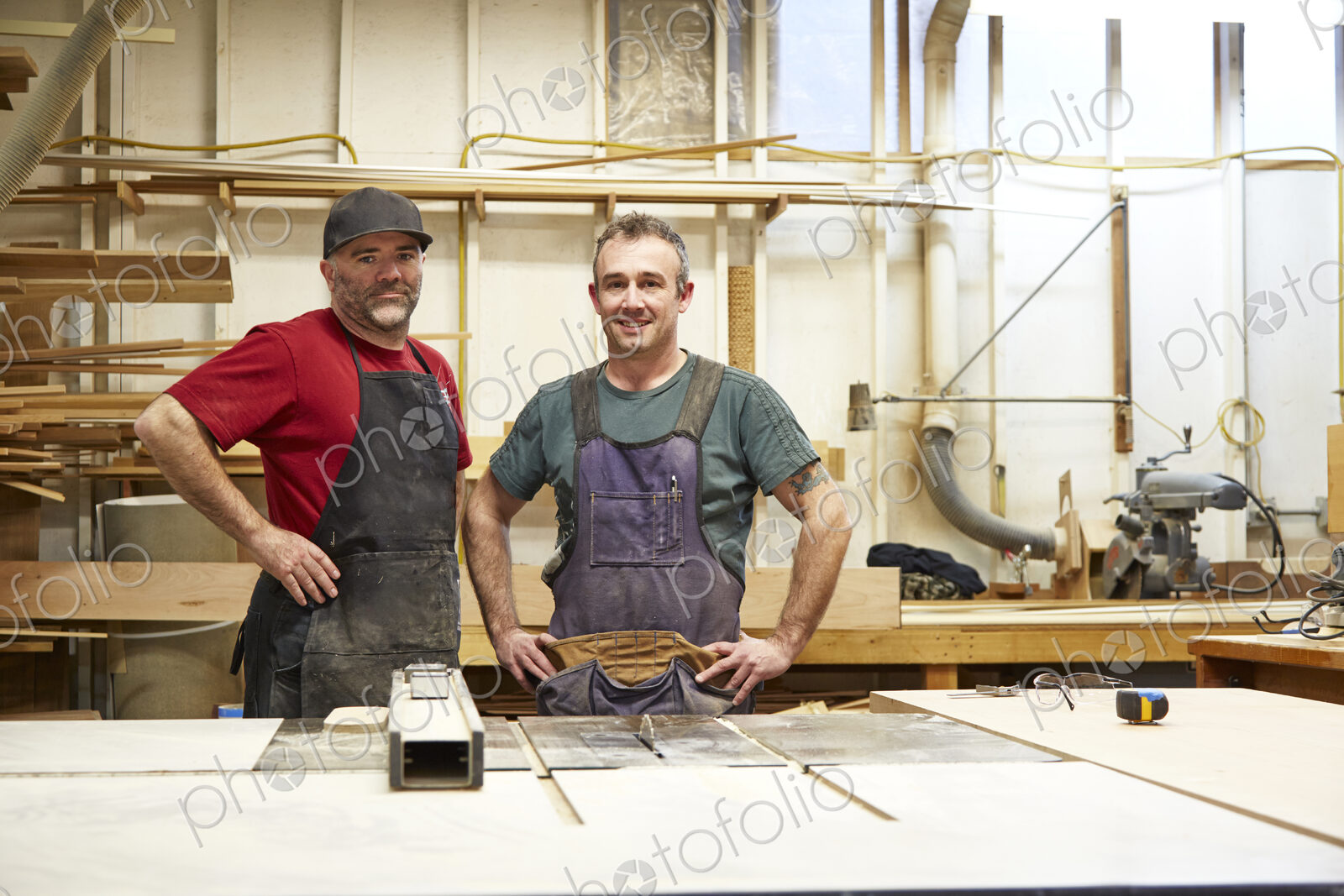 Carpenters smiling in workshop