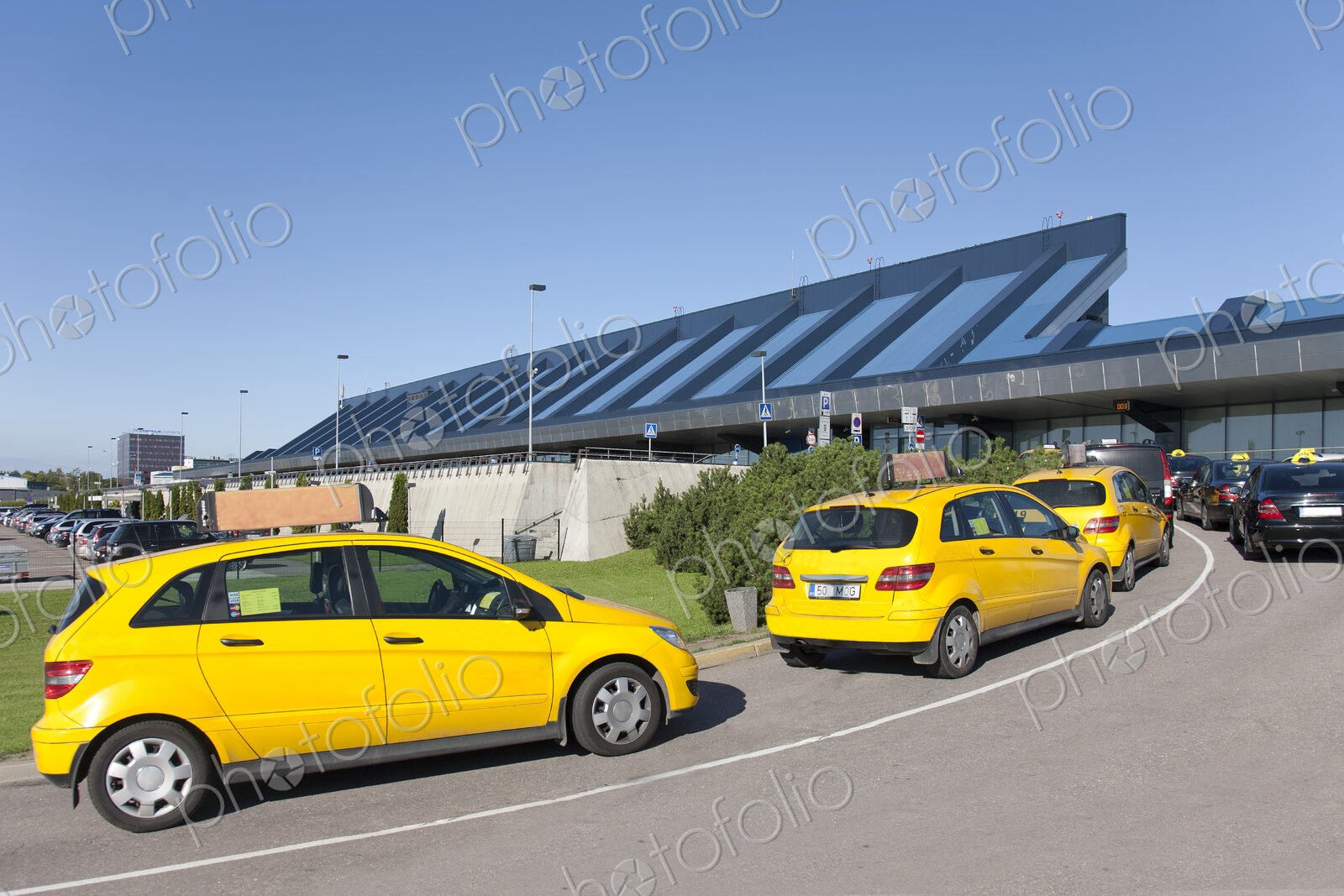 Cars Lining Up For Pickup at the Airport