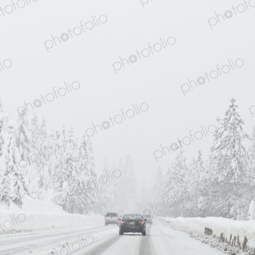 Cars driving on snow covered road Cars driving on snow covered road