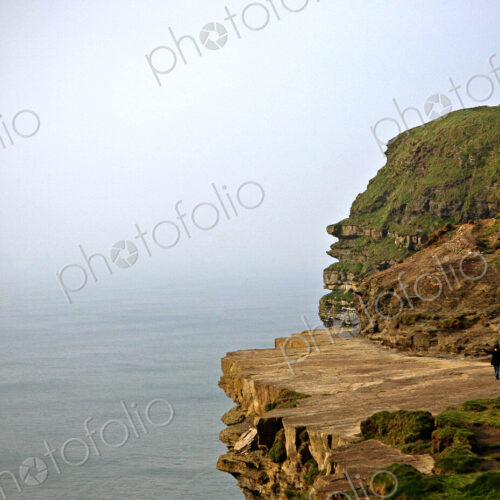 Castle on cliff near ocean Castle on cliff near ocean