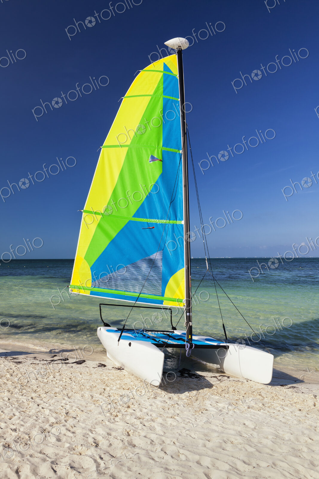 Catamaran sailing boat on the beach